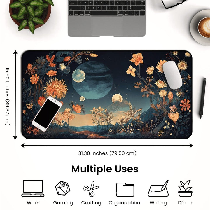 Home Decor - A Celestial Floral Desk Mat – Large Moon - Themed Mouse Pad for Office or Gaming is placed on a desk, creating a spacious workspace with its dimensions of 31.30 x 15.50 inches. Adorned with floral and planetary designs, this large, rectangular mat complements nearby items like a laptop, a coffee cup, a plant, and a mouse. Icons below highlight its versatility for work, gaming, crafting, organization, writing, and décor purposes. - Kaladyn Designs