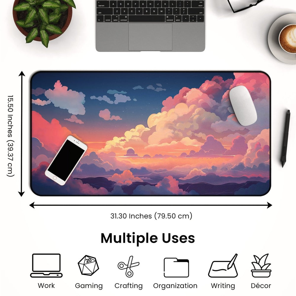 Home Decor - A Cloud Desk Mat – Cute Large Mouse Pad for Gaming & Office Setup with vibrant sunset cloud designs is placed on a desk. It measures 15.50 inches by 31.30 inches and supports multiple uses including work, gaming, crafting, organization, writing, and décor. A laptop, phone, pen, and cup of coffee are also visible for added kawaii desk decor charm. - Kaladyn Designs