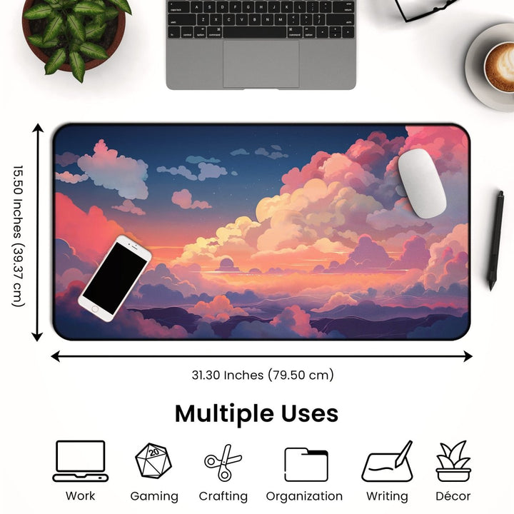 Home Decor - A Cloud Desk Mat – Cute Large Mouse Pad for Gaming & Office Setup with vibrant sunset cloud designs is placed on a desk. It measures 15.50 inches by 31.30 inches and supports multiple uses including work, gaming, crafting, organization, writing, and décor. A laptop, phone, pen, and cup of coffee are also visible for added kawaii desk decor charm. - Kaladyn Designs