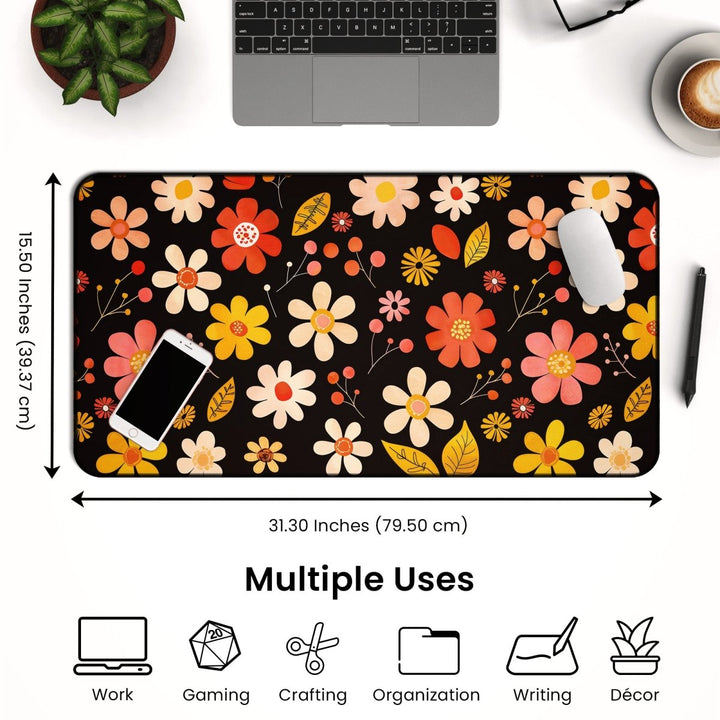 Home Decor - The Retro Floral Desk Mat – Vintage Flower Design Large Mouse Pad for Office & Gaming is beautifully arranged on a white table, with a phone, mouse, and pen adding to the scene. Measuring 31.30 inches by 15.50 inches (79.5 cm by 39.37 cm), this versatile desk mat features icons below the image that emphasize its multiple uses: work, gaming, crafting, organization, writing, and décor. - Kaladyn Designs